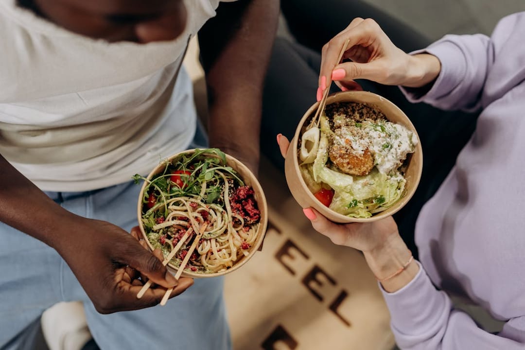 Free Man And Woman Eating Healthy Food Stock Photo